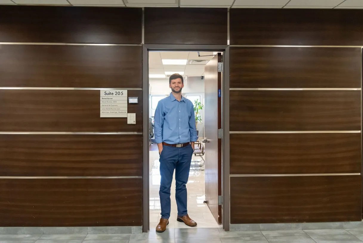 Dr. David Kroner at the entrance to Dental Korner, serving patients from across Nassau County